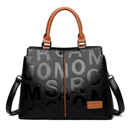 Luxus-Handtaschen mit Buchstabendruck